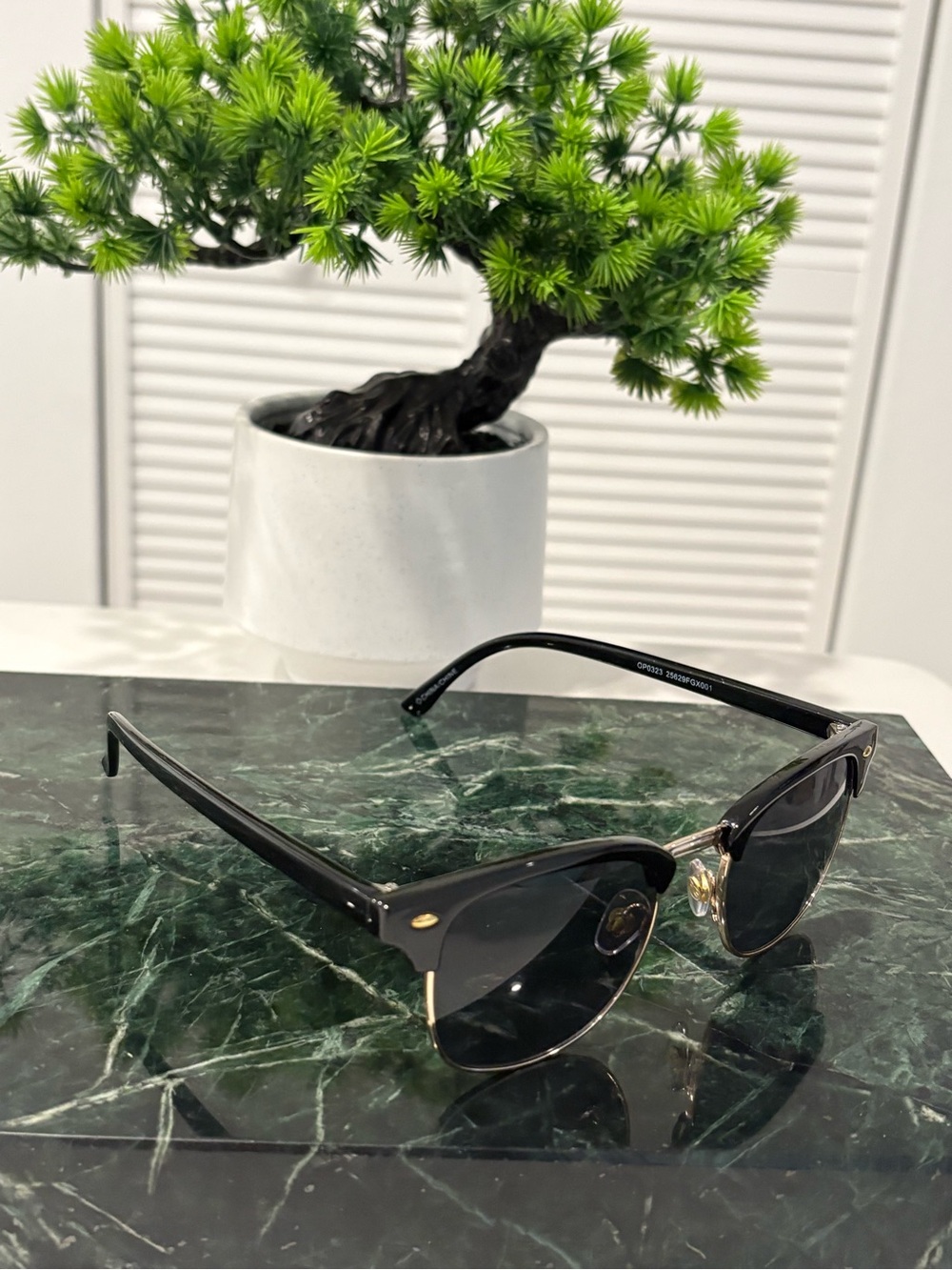 Foster Grant Black Sunglasses with Gold Accents